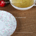 Seleccionado de porcelana fina de cerámica de color rosa flor hueso China taza de café y platillo Set